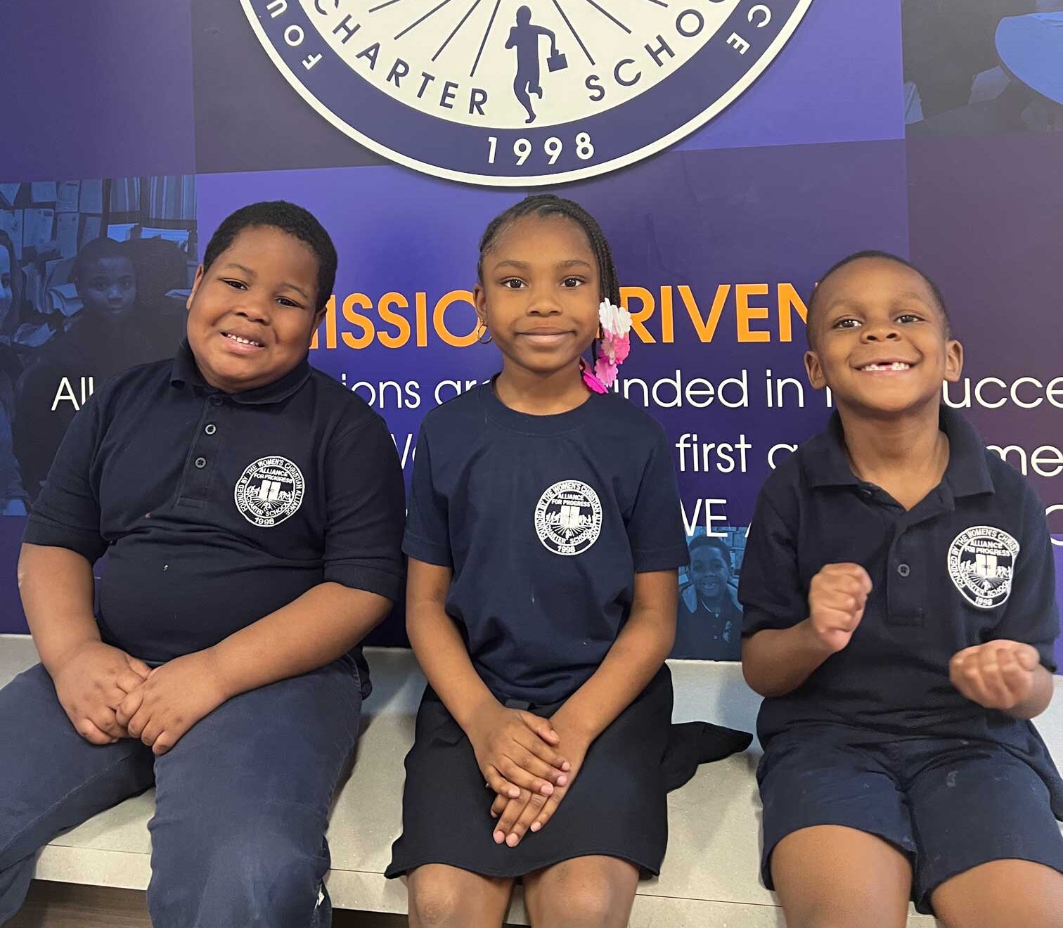 Young students in school uniforms